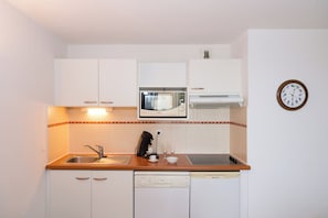 Fridge, microwave, dishwasher, coffee/tea maker