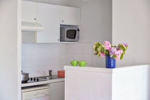Fridge, microwave, coffee/tea maker, toaster