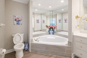 Shower, hair dryer, towels, toilet paper