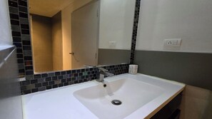Apartment, Balcony, City View | Bathroom | Shower, hair dryer, towels, toilet paper