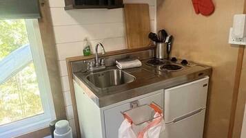 Fridge, stovetop, toaster, cookware/dishes/utensils