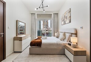 2 chambres, coffres-forts dans les chambres, fer et planche à repasser