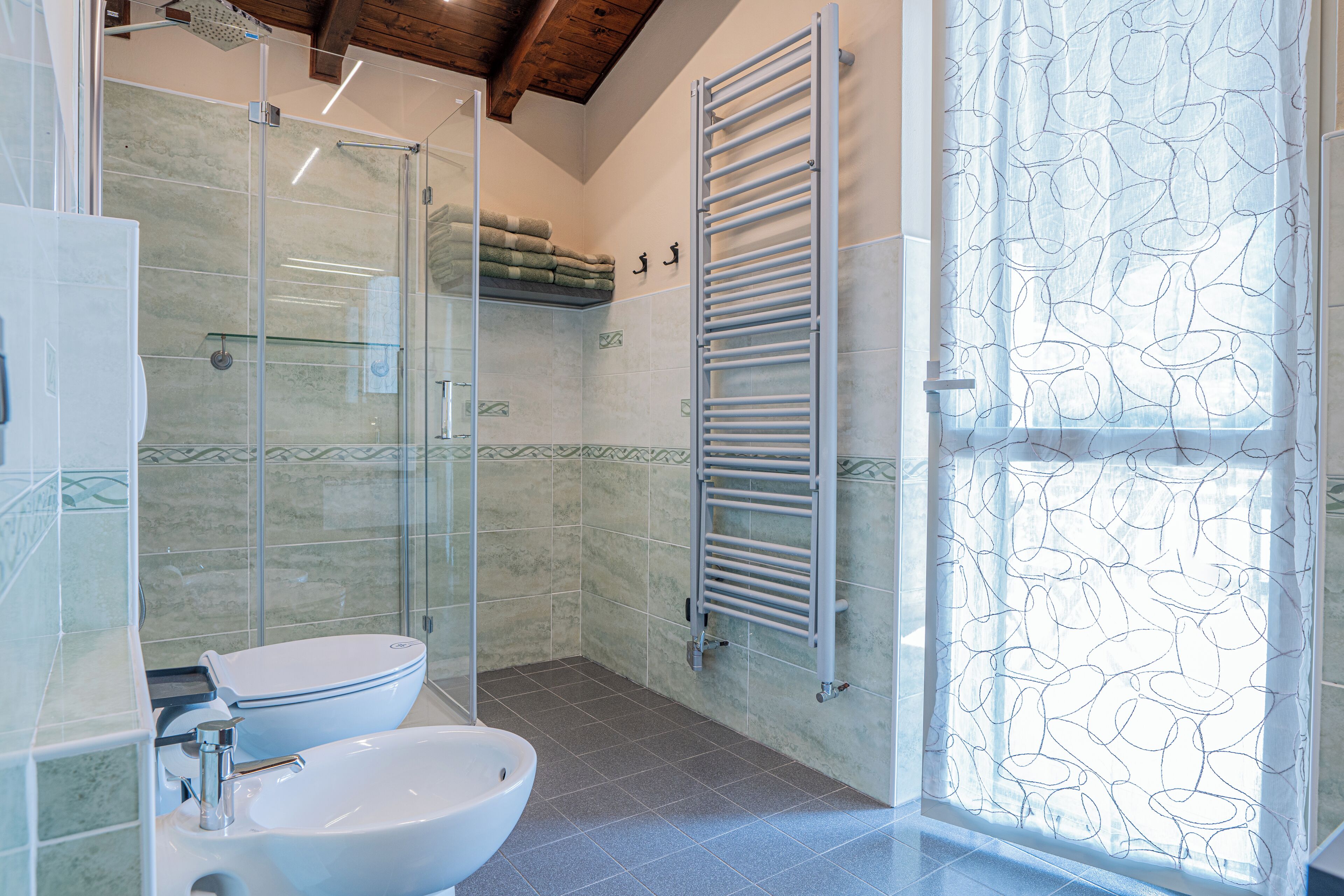 Shower, eco-friendly toiletries, hair dryer, bidet