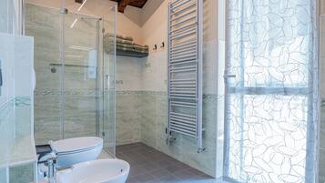 Shower, eco-friendly toiletries, hair dryer, bidet