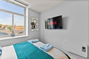 2 habitaciones, tabla de planchar con plancha y acceso a internet 