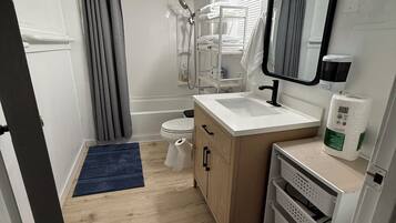Hair dryer, towels, soap, shampoo