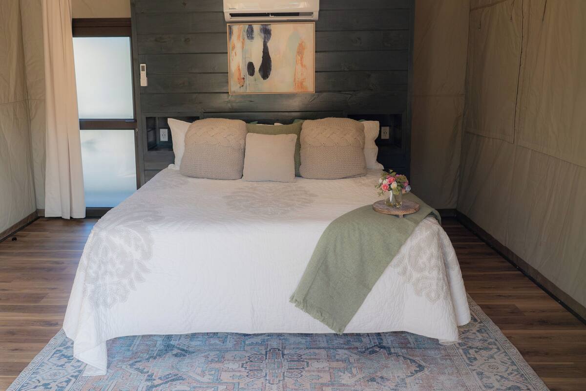 Desk, blackout drapes, bed sheets