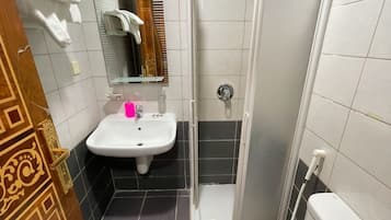 Separate tub and shower, free toiletries, towels, soap