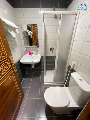 Separate tub and shower, free toiletries, towels, soap
