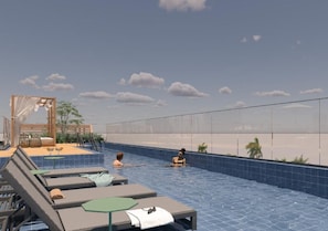 Una piscina al aire libre (de 08:00 a 22:00), sombrillas, tumbonas