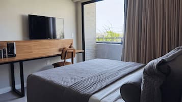 Suíte luxo, vista para o mar | Cofres nos quartos, cortinas blackout, Wi-Fi de cortesia, roupa de cama