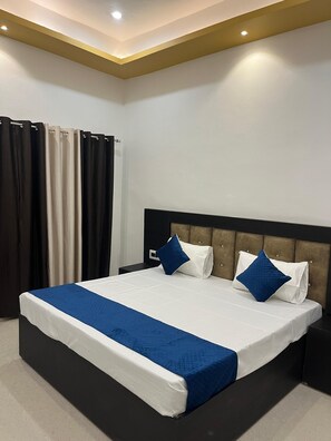 Quarto luxo, vista para o jardim | Wi-Fi de cortesia