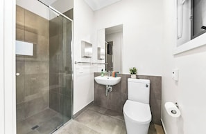 Shower, towels, soap, shampoo