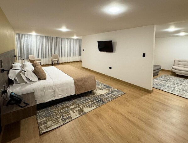 Junior Suite | In-room safe, blackout drapes, iron/ironing board, free WiFi