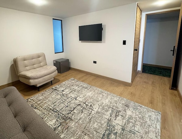 Suite júnior | Caixa forta a l'habitació, cortines opaques i planxa i posts de planxar