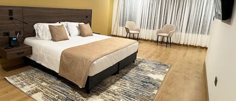 Junior Suite | In-room safe, blackout curtains, iron/ironing board, free WiFi