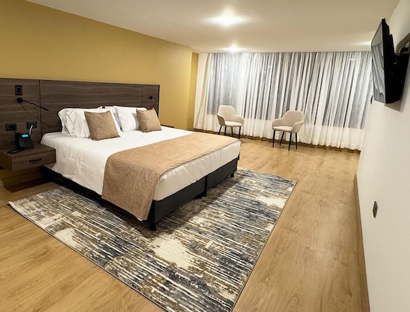 Suite Junior | Coffres-forts dans les chambres, rideaux occultants