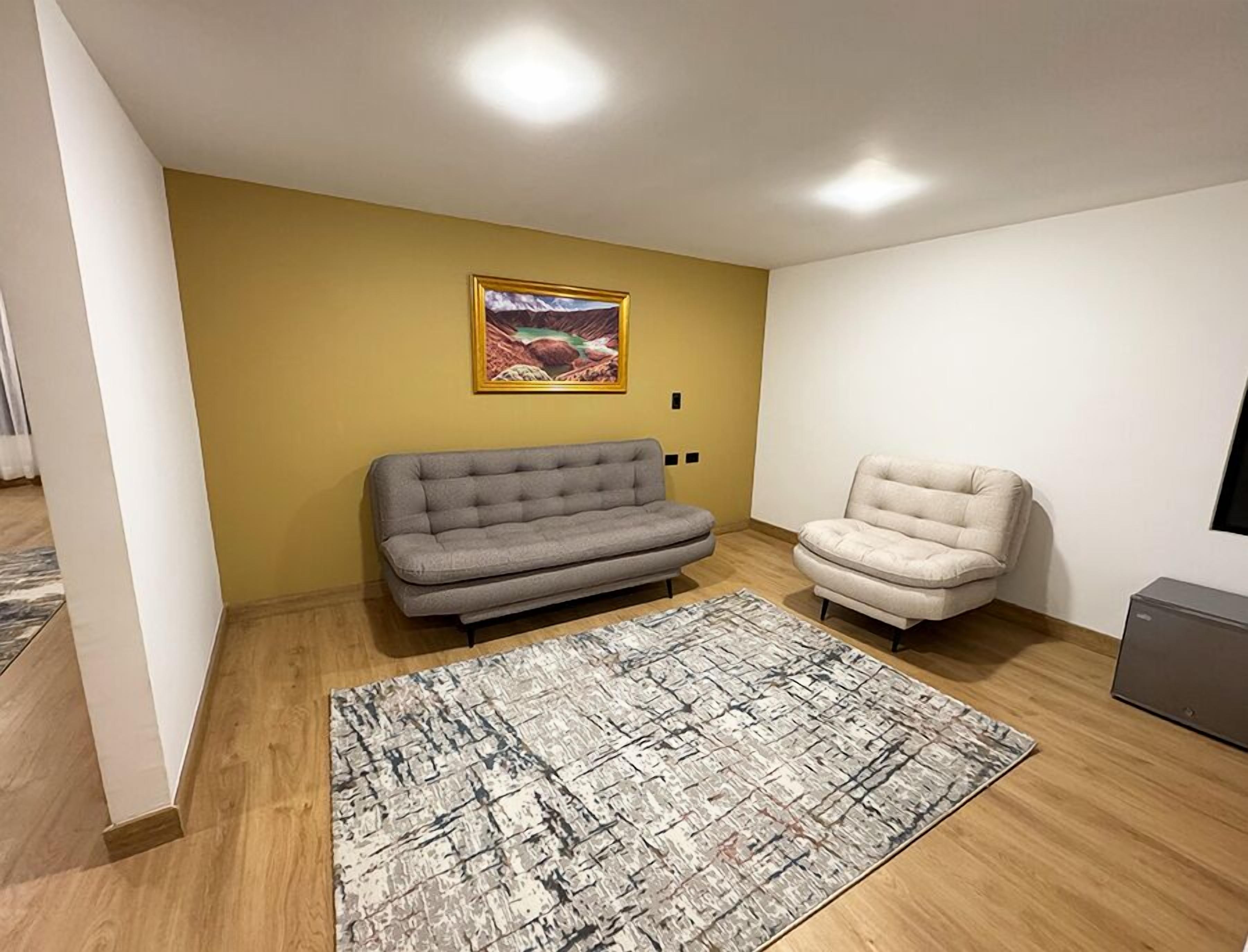 Junior Suite | In-room safe, blackout drapes, iron/ironing board, free WiFi