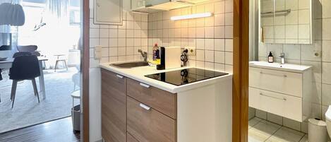 Fridge, stovetop, toaster, cookware/dishes/utensils