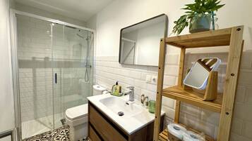 Eco-friendly toiletries, hair dryer, towels, soap