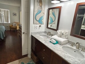 Shower, towels, soap, toilet paper