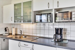 Fridge, microwave, coffee/tea maker, toaster