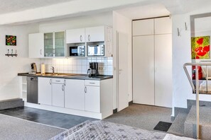 Fridge, microwave, coffee/tea maker, toaster