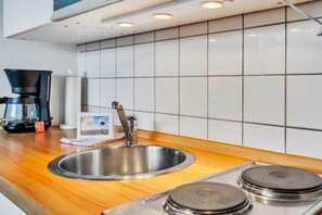 Fridge, microwave, coffee/tea maker, toaster