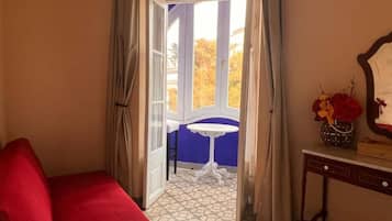 Comfort Triple Room, Balcony, City View | In-room safe, desk, blackout drapes, iron/ironing board
