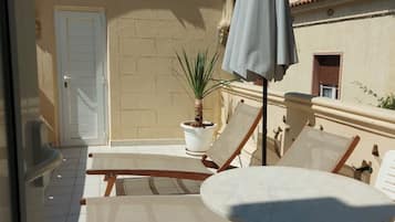 Superior Suite, Terrace, City View | In-room safe, desk, blackout drapes, iron/ironing board