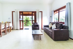Apartamento, 2 quartos, vista para o jardim | Área de estar