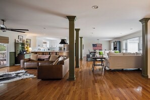 Smart TV, fireplace, books, printers