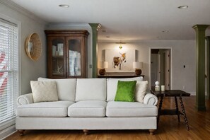 Smart TV, fireplace, books, printers