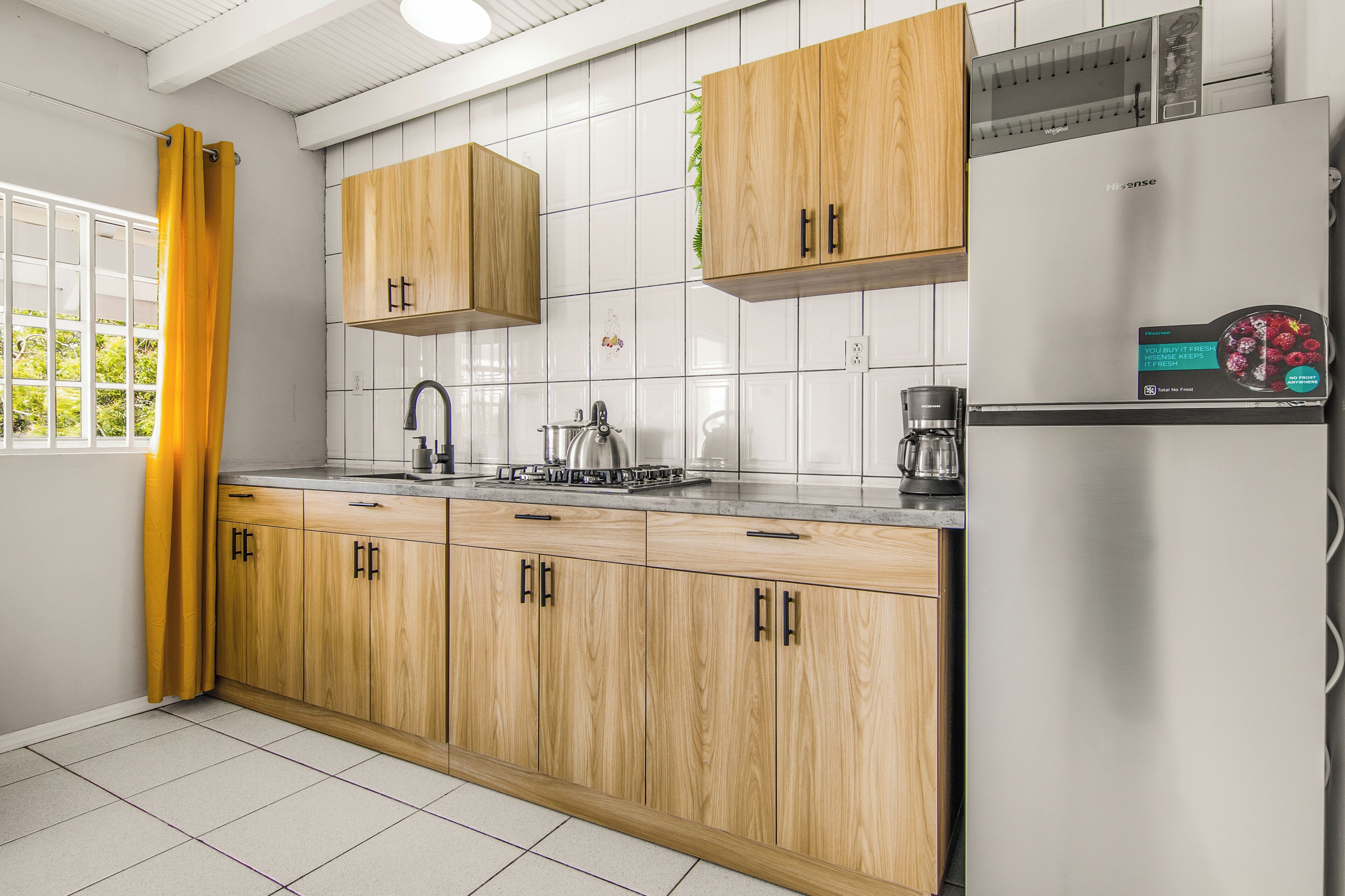 Fridge, microwave, stovetop, coffee/tea maker