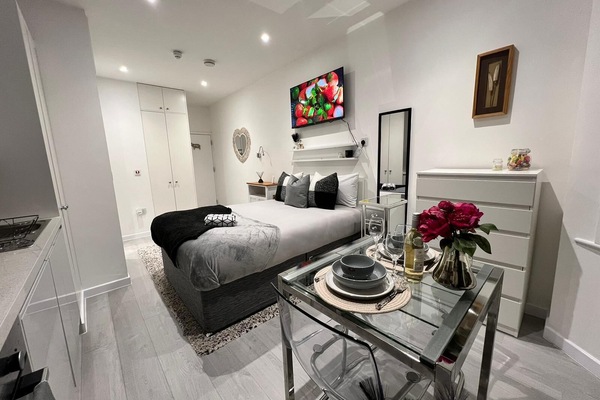 Premier Studio, Patio | Egyptian cotton sheets, premium bedding, laptop workspace