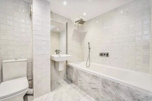 Hair dryer, towels, soap, toilet paper