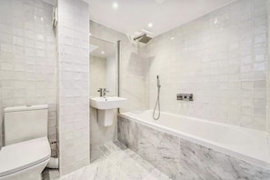 Hair dryer, towels, soap, toilet paper