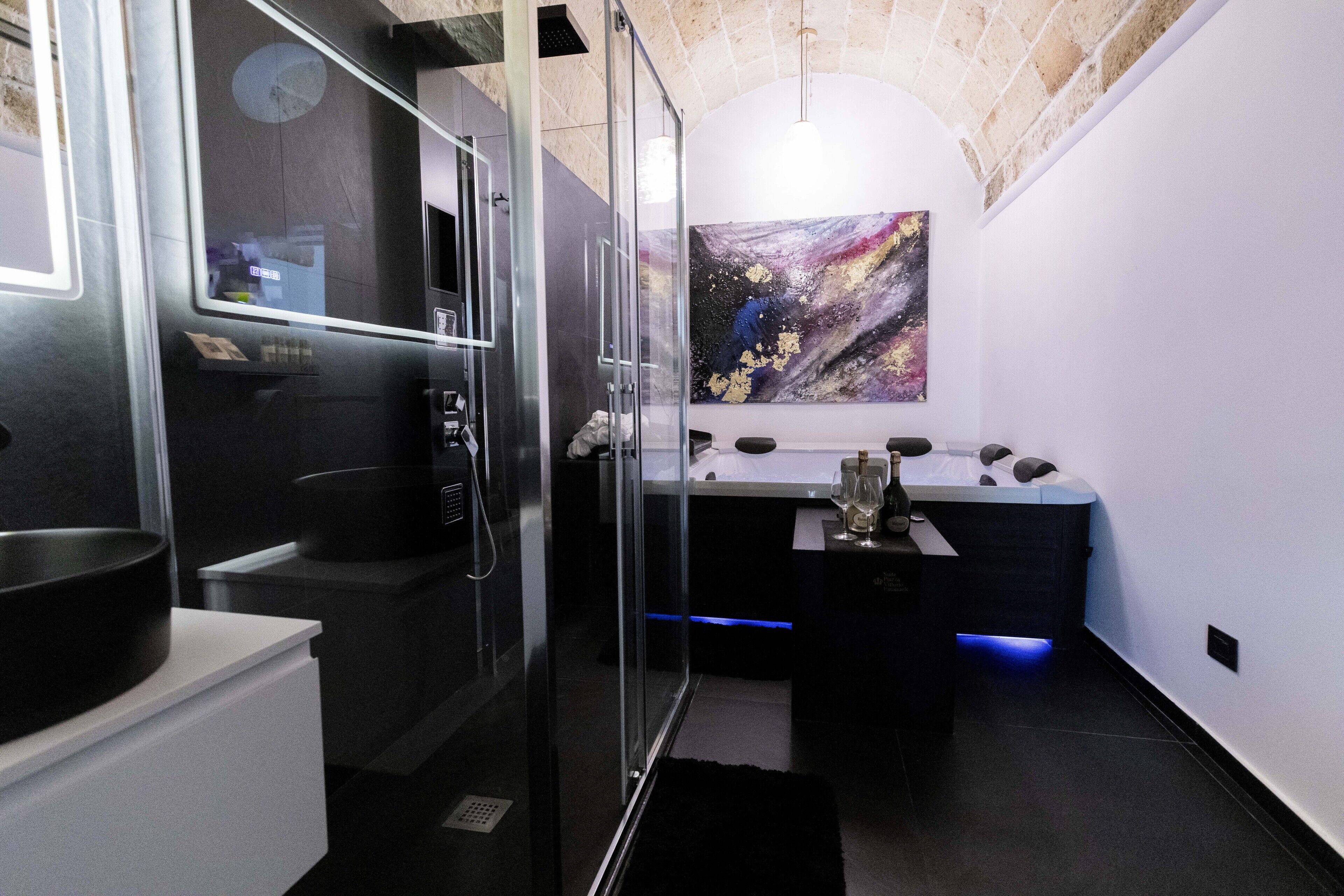 Shower, jetted tub, hair dryer, bidet