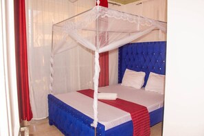 1 غرفة نوم ومكواة/لوح كي وخدمة الإنترنت وملاءات أسرّة