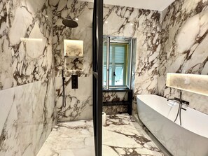 Hair dryer, towels, soap, shampoo