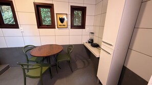 Deluxe Quadruple Room | Private kitchen | Fridge, stovetop, cookware/dishes/utensils