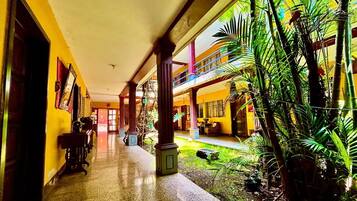 Classic Twin Room, City View | Living area