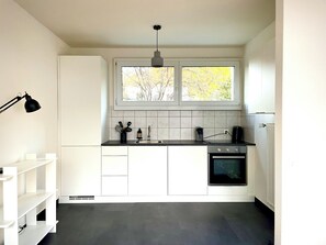 Frigorífic, forn, placa de cuina i rentaplats