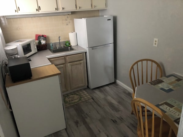 Fridge, microwave, coffee/tea maker, toaster