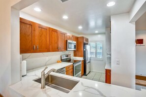 Condo, Multiple Beds, Patio, Ocean View (Sea Haven 113) | Private kitchen | Coffee/tea maker