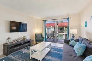 Apartment, Multiple Beds, Balcony, Pool View (Pelican Inlet C222) | Living area | TV
