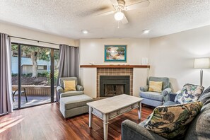 Condo, Multiple Beds, Hot Tub, Ocean View (Hibiscus F103) | Living area | TV, fireplace