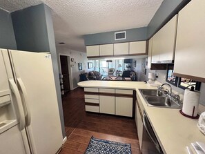 Condo, Multiple Beds, Hot Tub, Ocean View (Hibiscus A103) | Private kitchen | Fridge, microwave, oven, stovetop