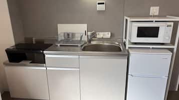 Family Apartment, Non Smoking, Kitchen | Blackout drapes, soundproofing, iron/ironing board, free WiFi