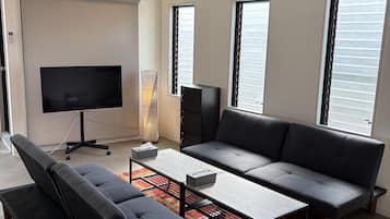 Family Apartment, Non Smoking, Kitchen | Blackout drapes, soundproofing, iron/ironing board, free WiFi